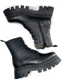 Track Sole 8-Eye Lace Up Boots in Black